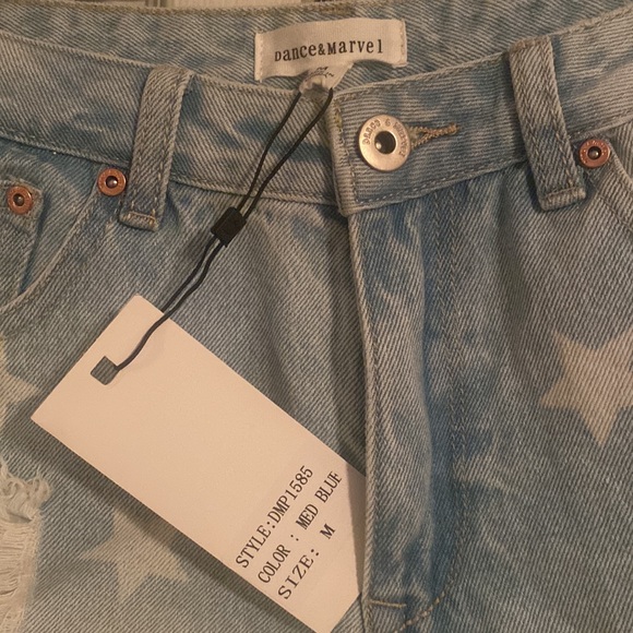 Light wash cut off Jean shorts with stars. NWT - Picture 2 of 3